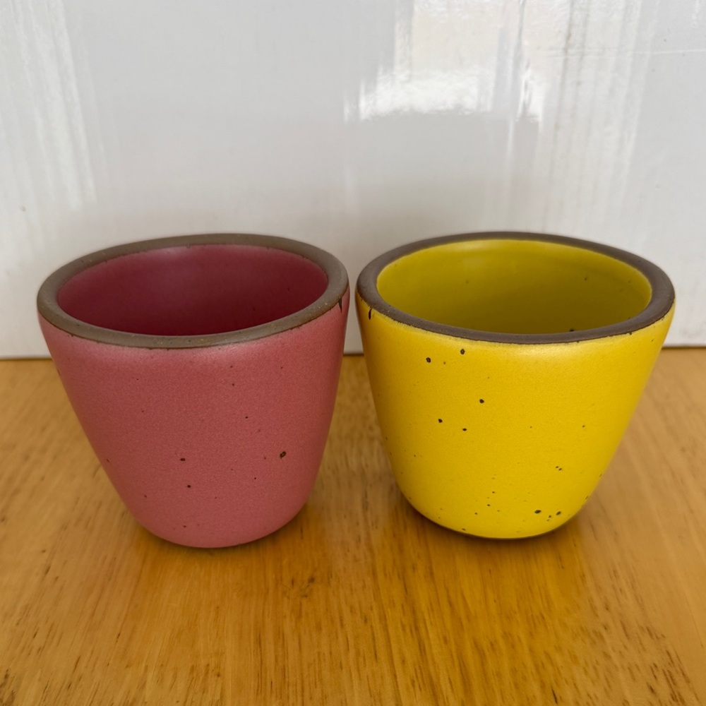 East Fork x Diaspora Co Kulhad Mugs in Rococo Pink and Pollen Yellow